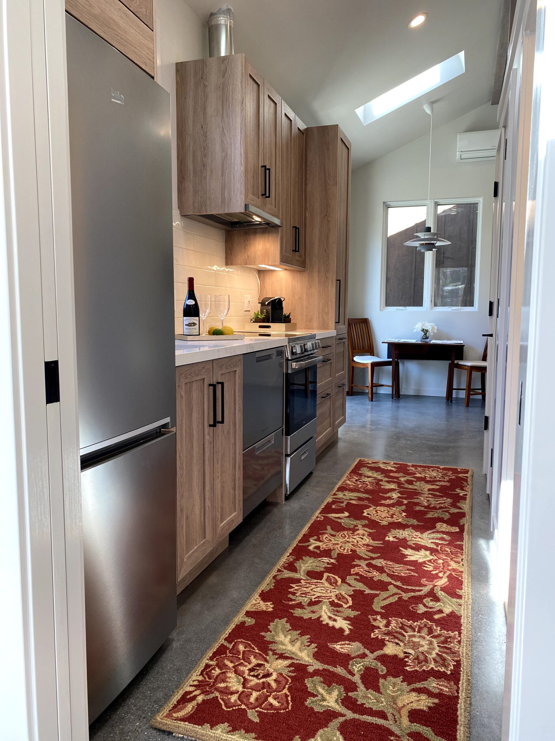 Picture of Green Living Builders installed these kitchen cabinets to allow functional space for full-size appliances. - Green Living Builders LLC