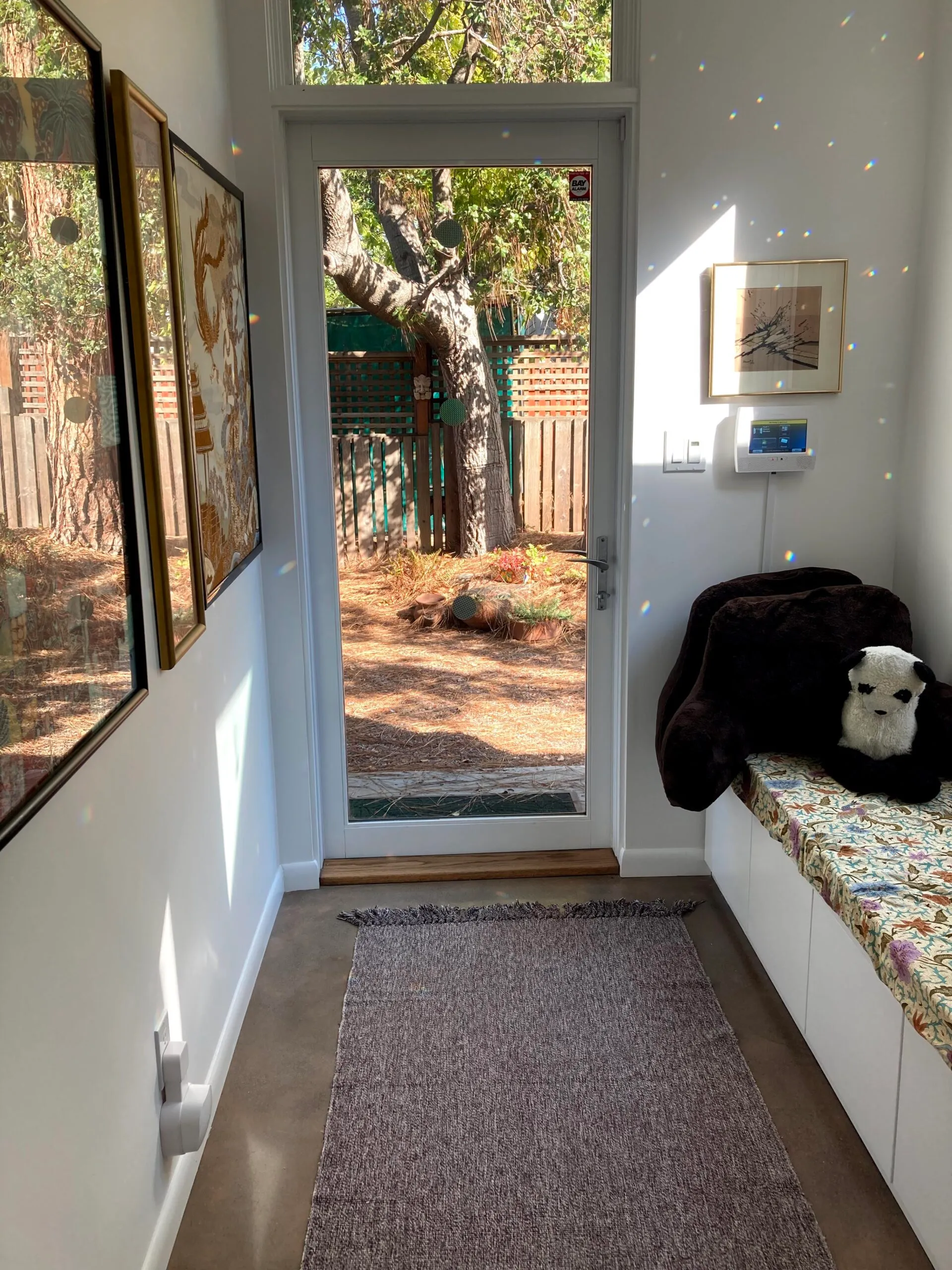 Picture of Green Living Builders installed a built-in bench in this entryway for storage purposes. - Green Living Builders LLC