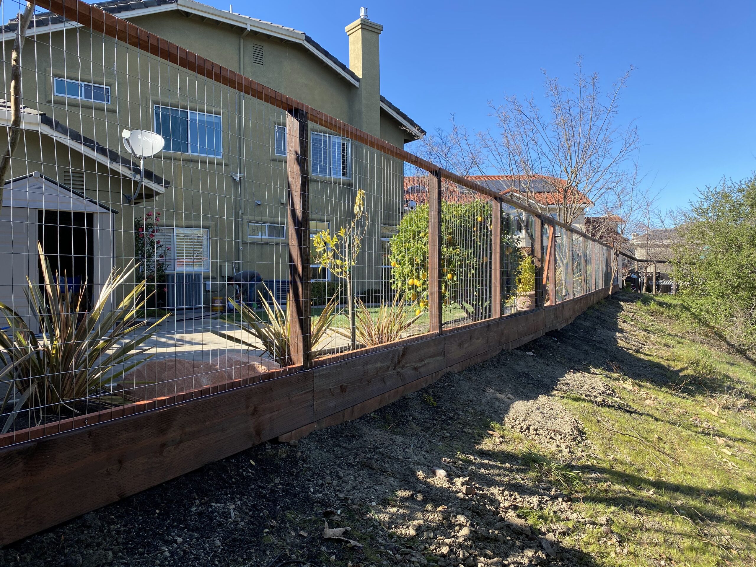 Picture of This fence features galvanized deer wire. - AMM Fencing