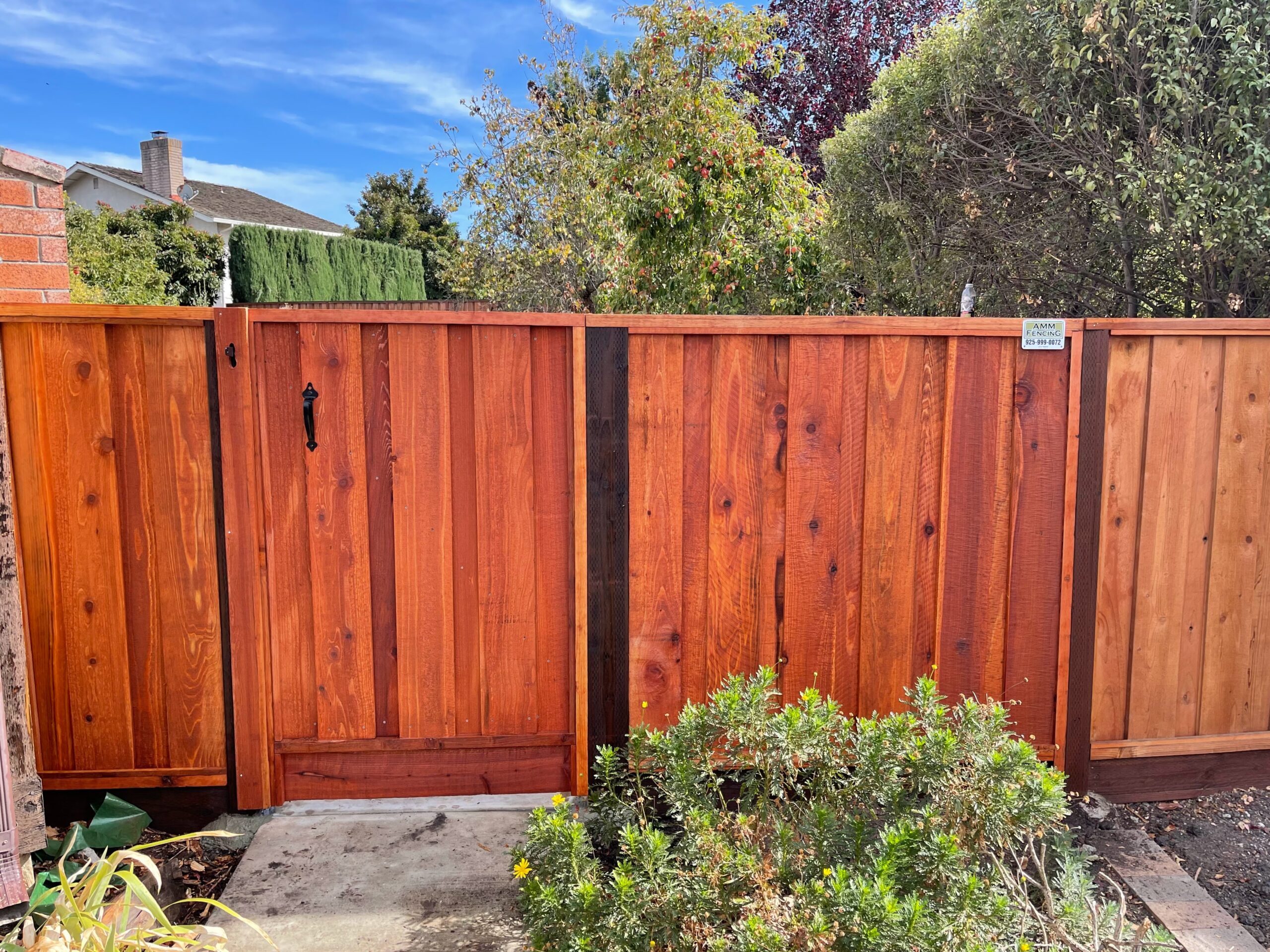 Picture of This standard redwood gate is AMM Fencing’s most popular model. - AMM Fencing