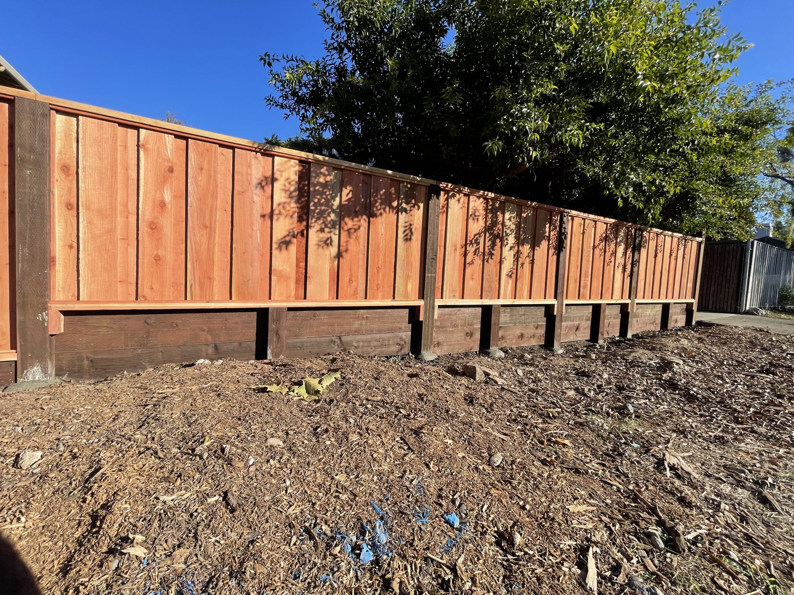 Picture of A recent retaining wall and fence project by AMM Fencing - AMM Fencing