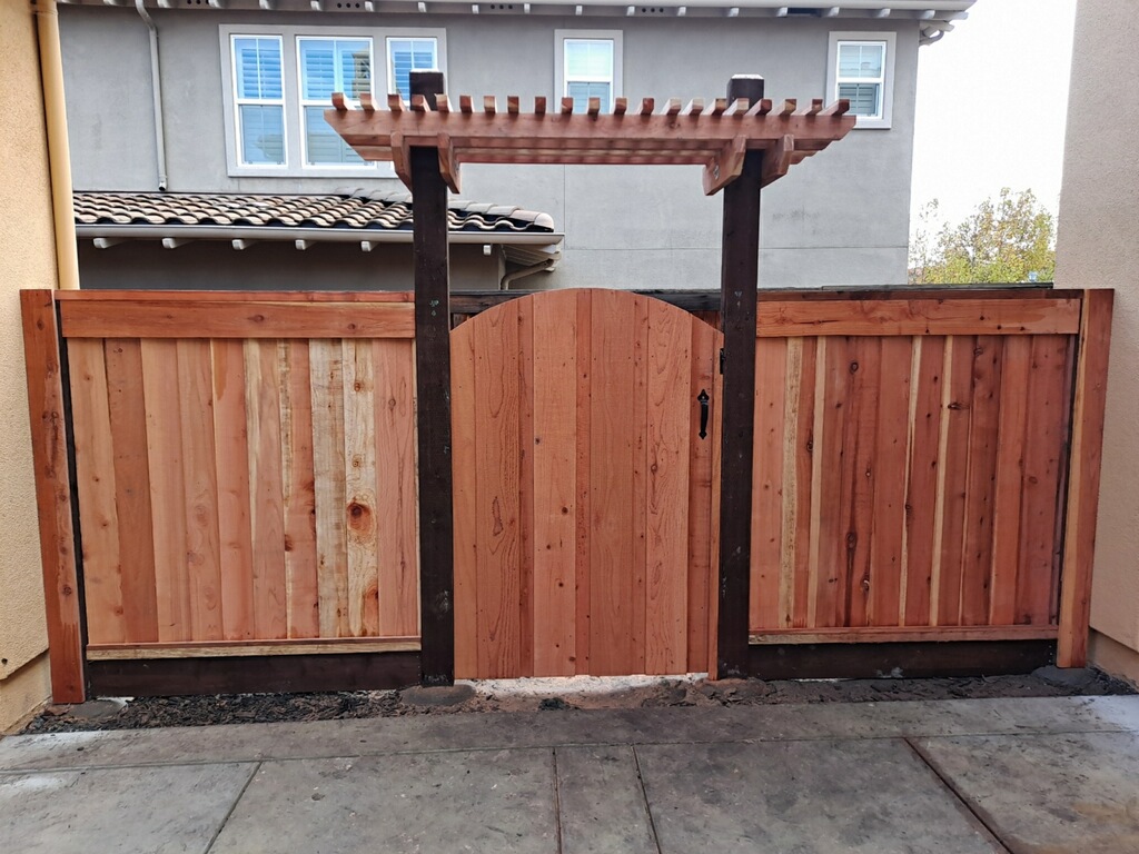 Picture of AMM Fencing added a trellis to this redwood gate installation. - AMM Fencing