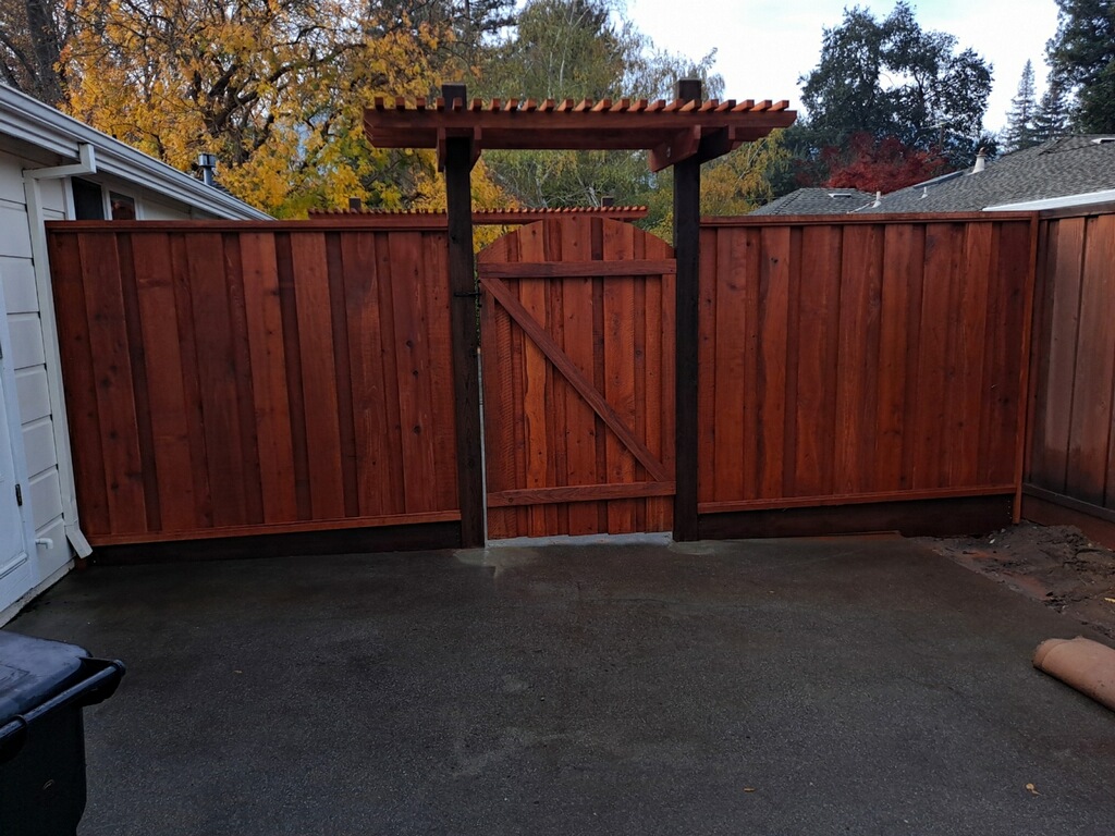 Picture of AMM Fencing installs redwood gates with trellises. - AMM Fencing