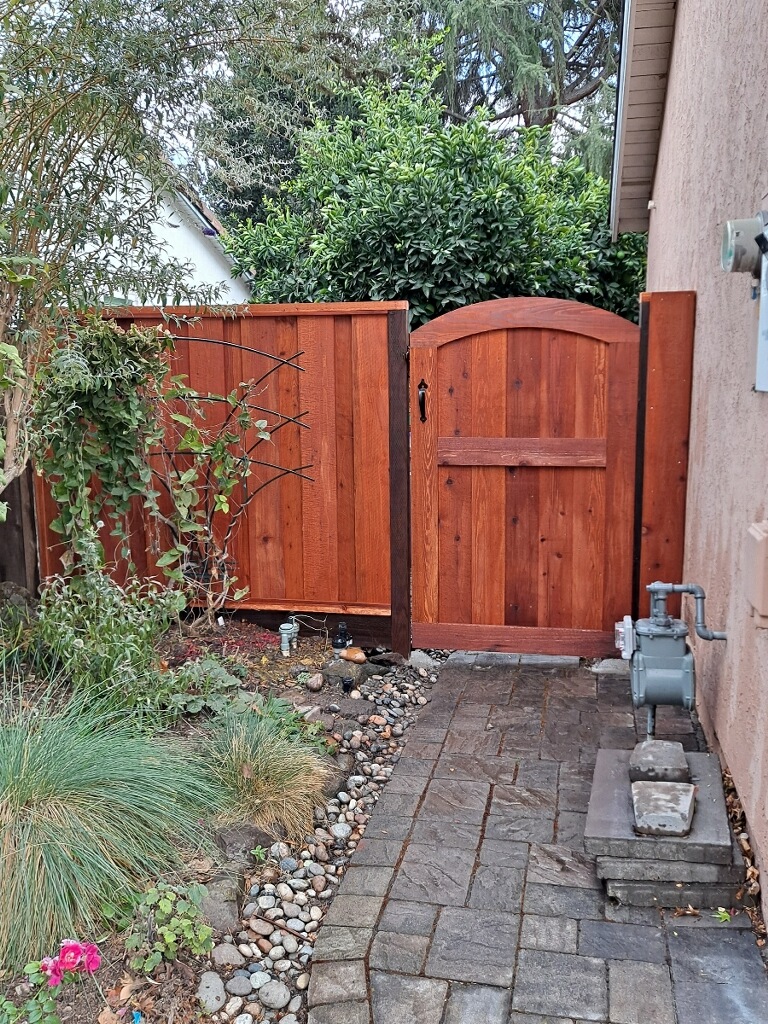 Picture of A recent custom framed arch gate installation by AMM Fencing - AMM Fencing