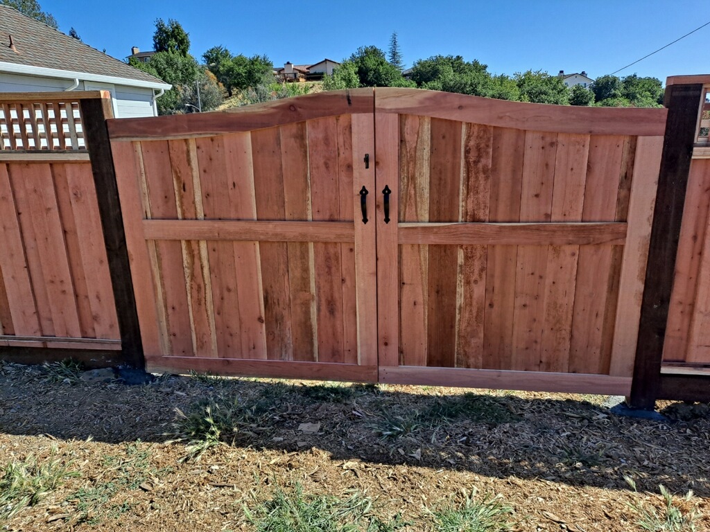 Picture of A recent custom framed arch gate installation by AMM Fencing - AMM Fencing