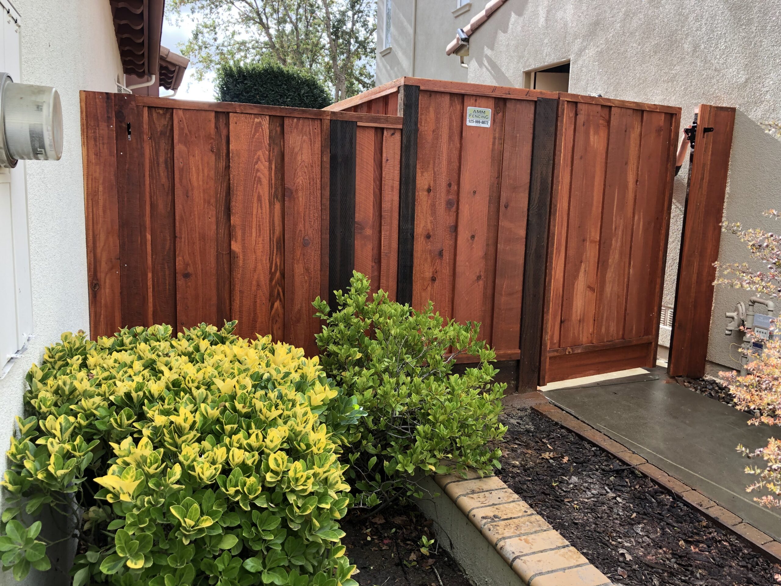 Picture of AMM Fencing installs standard redwood gates. - AMM Fencing