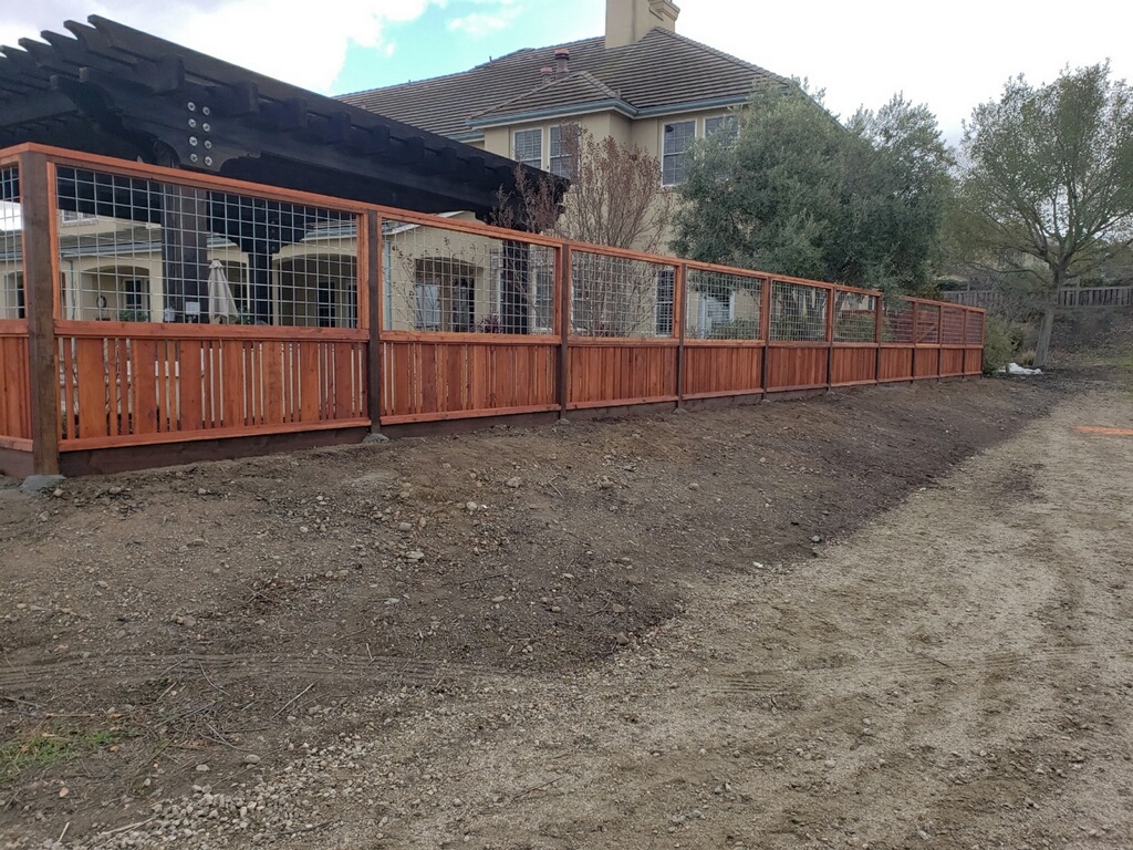 Picture of A recent hybrid wire and wood fence project by AMM Fencing - AMM Fencing