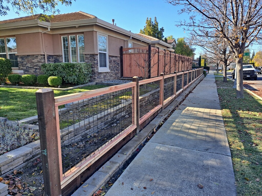 Picture of AMM Fencing installed this black hog wire fence. - AMM Fencing