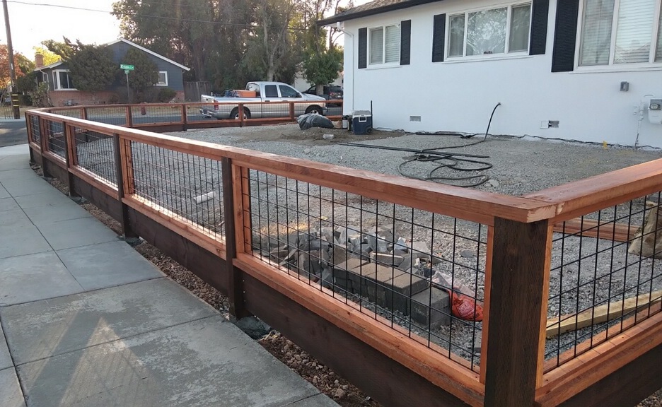 Picture of AMM Fencing used black hog wire to build this fence. - AMM Fencing