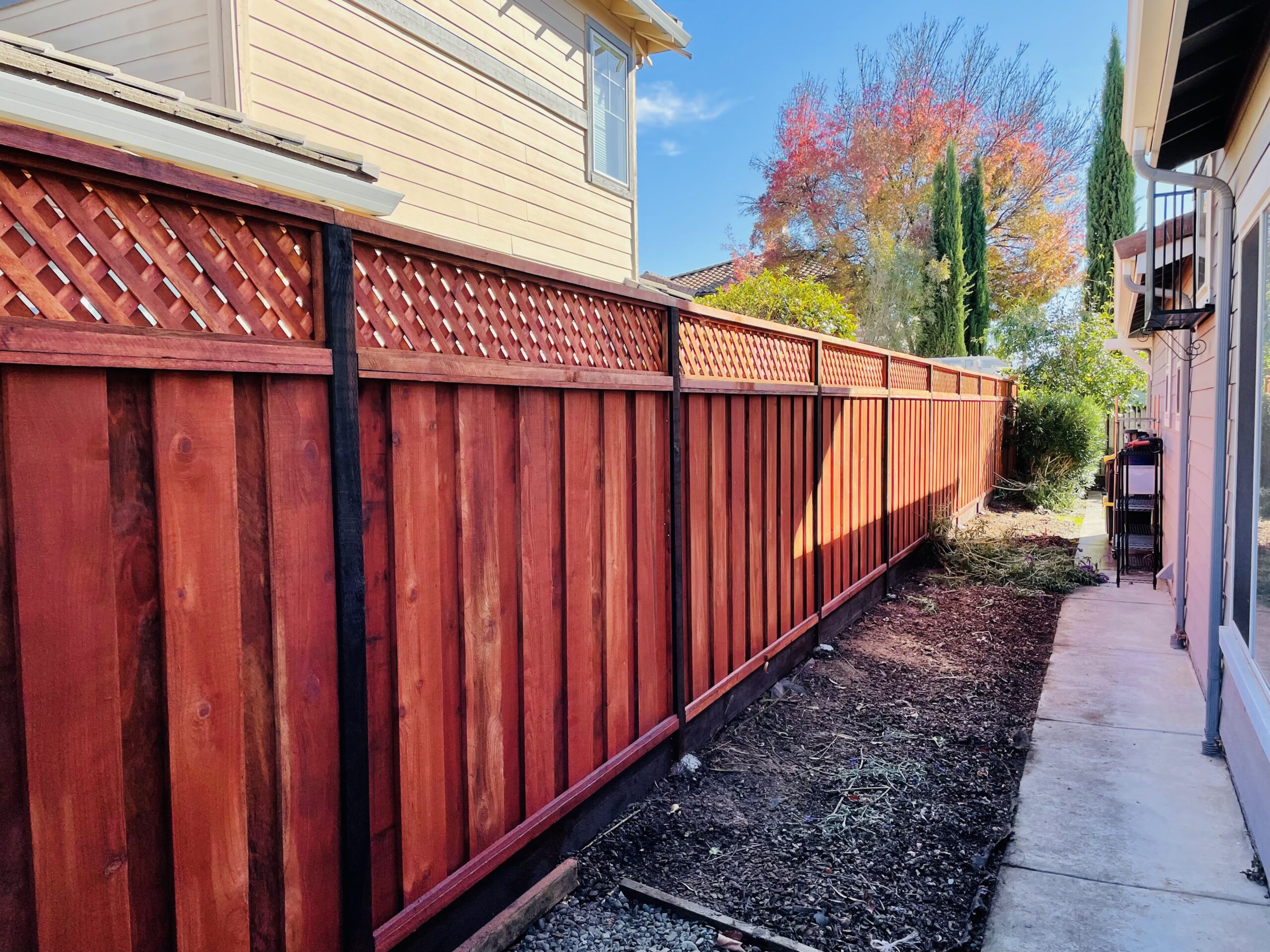 Picture of AMM Fencing installed this lattice-style privacy fence. - AMM Fencing