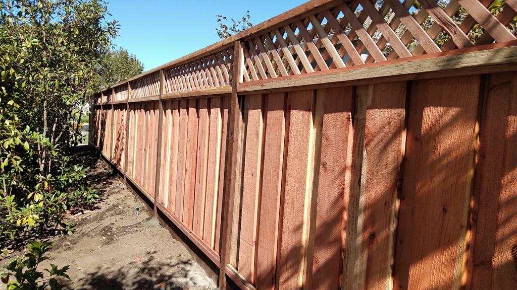 Picture of AMM Fencing installs jumbo lattice-style redwood fences. - AMM Fencing