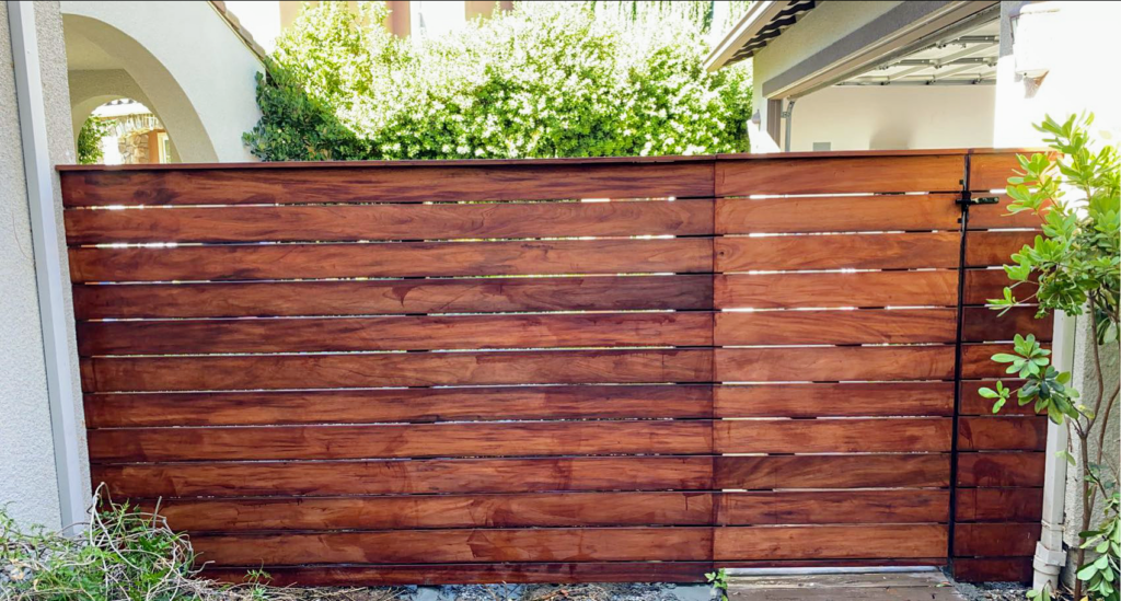 Picture of AMM Fencing installs horizontal redwood fences. - AMM Fencing