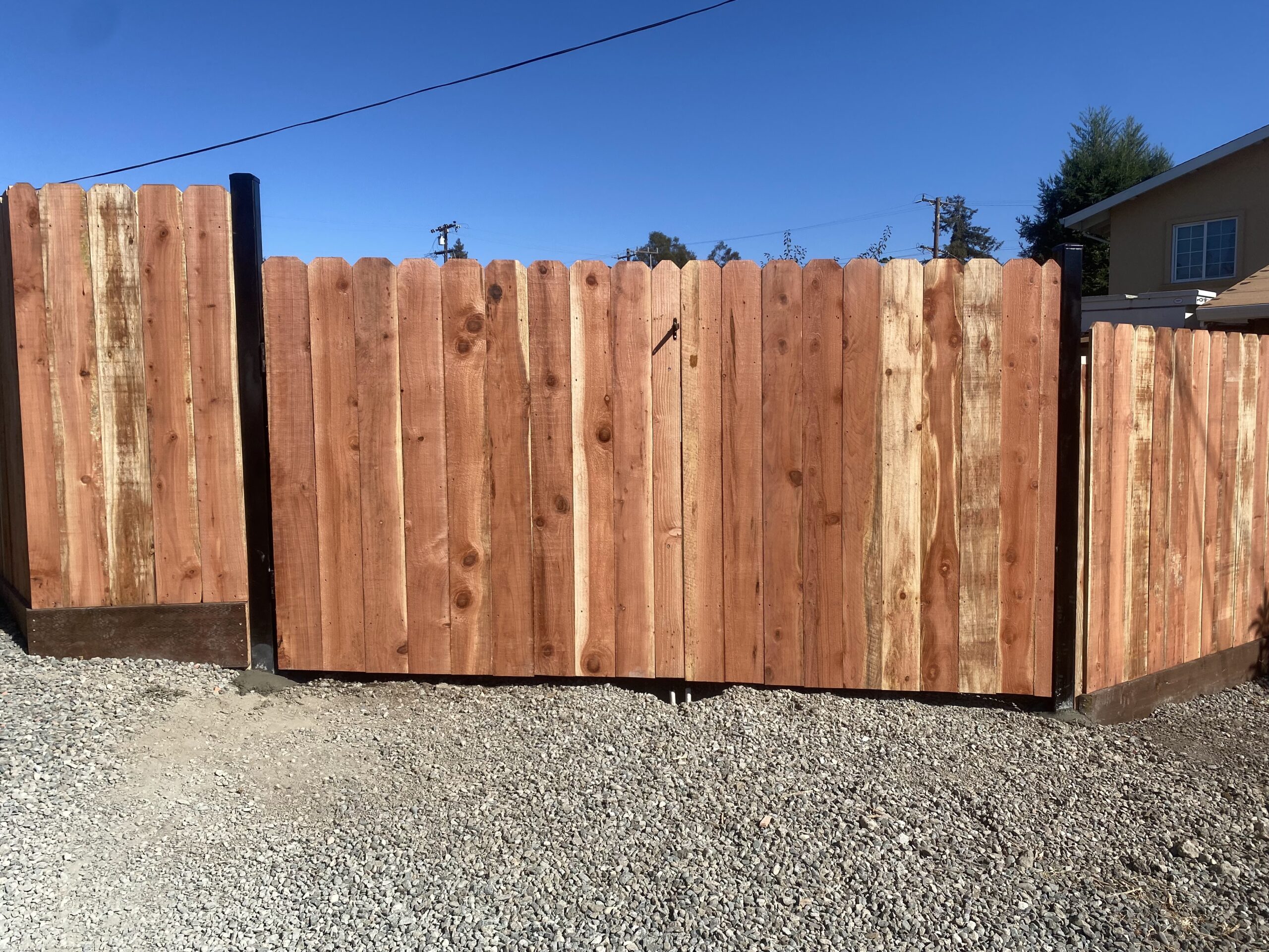 Picture of AMM Fencing installed this dog-ear redwood fence. - AMM Fencing