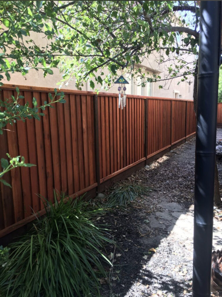 Picture of AMM Fencing installed this louvered redwood fence. - AMM Fencing