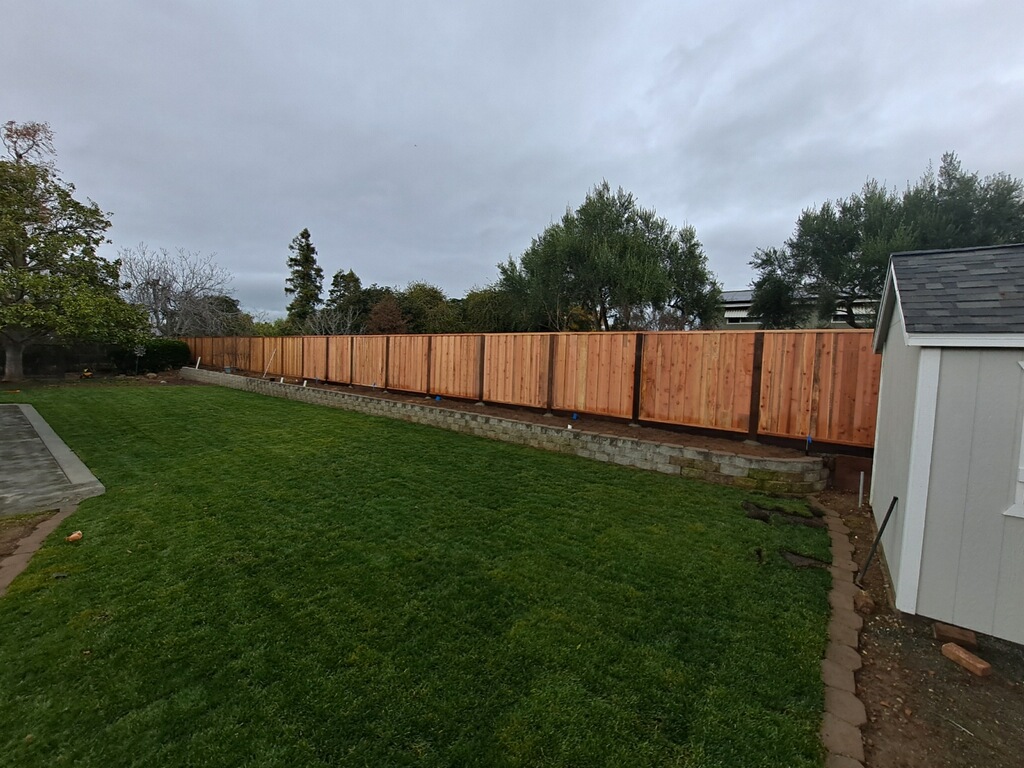 Picture of AMM Fencing installs board-on-board redwood fences. - AMM Fencing